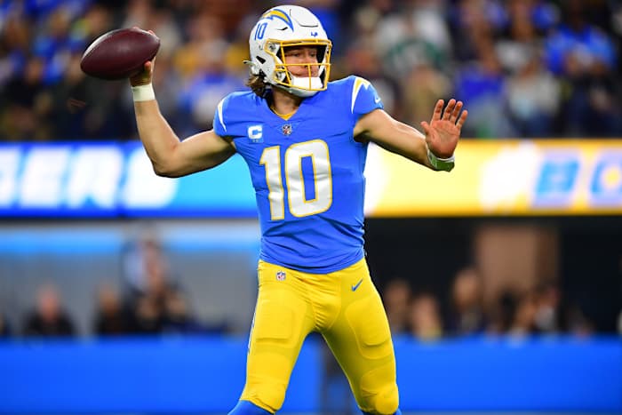Dec 11, 2022; Inglewood, California, USA; Los Angeles Chargers quarterback Justin Herbert (10) throws against the Miami Dolphins during the first half at SoFi Stadium. Mandatory Credit: Gary A. Vasquez-USA TODAY Sports